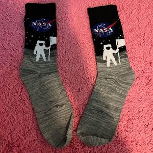 NASA astronaut moon socks. Women’s size or possibly older kids. Never worn.